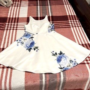 White dress with blue flowers